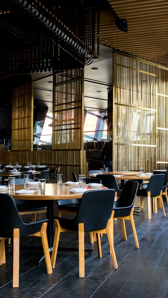 The warm, intimate dining room at Pizzerija Riva